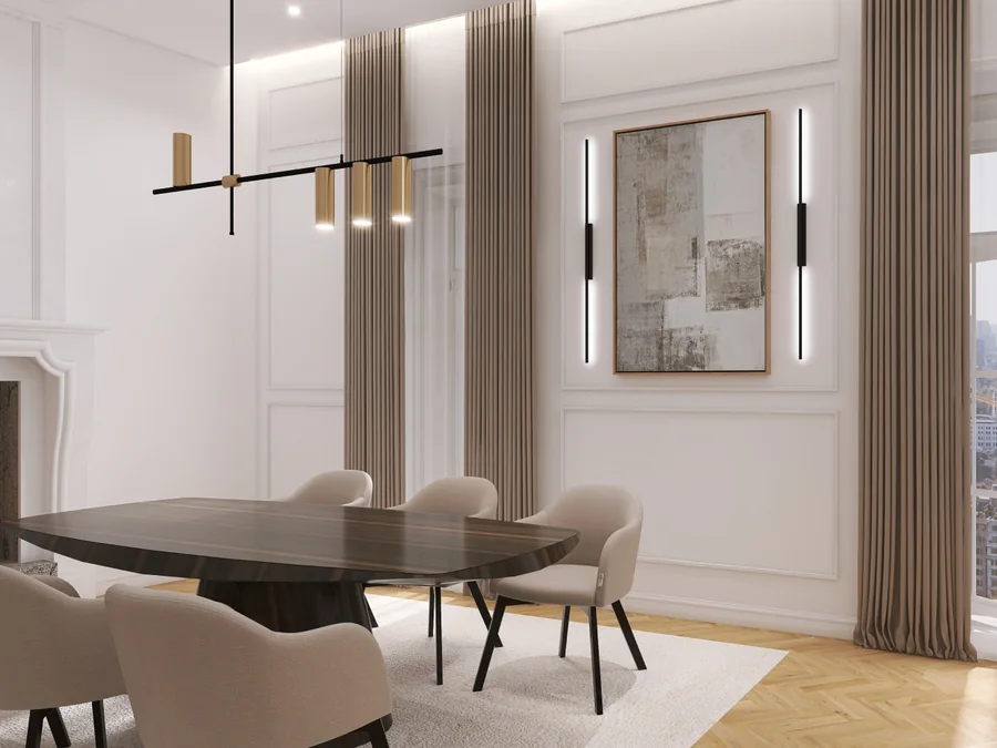 Sala de jantar do apartamento no Chiado, com molduras de parede, lareira e pavimento em espinhado